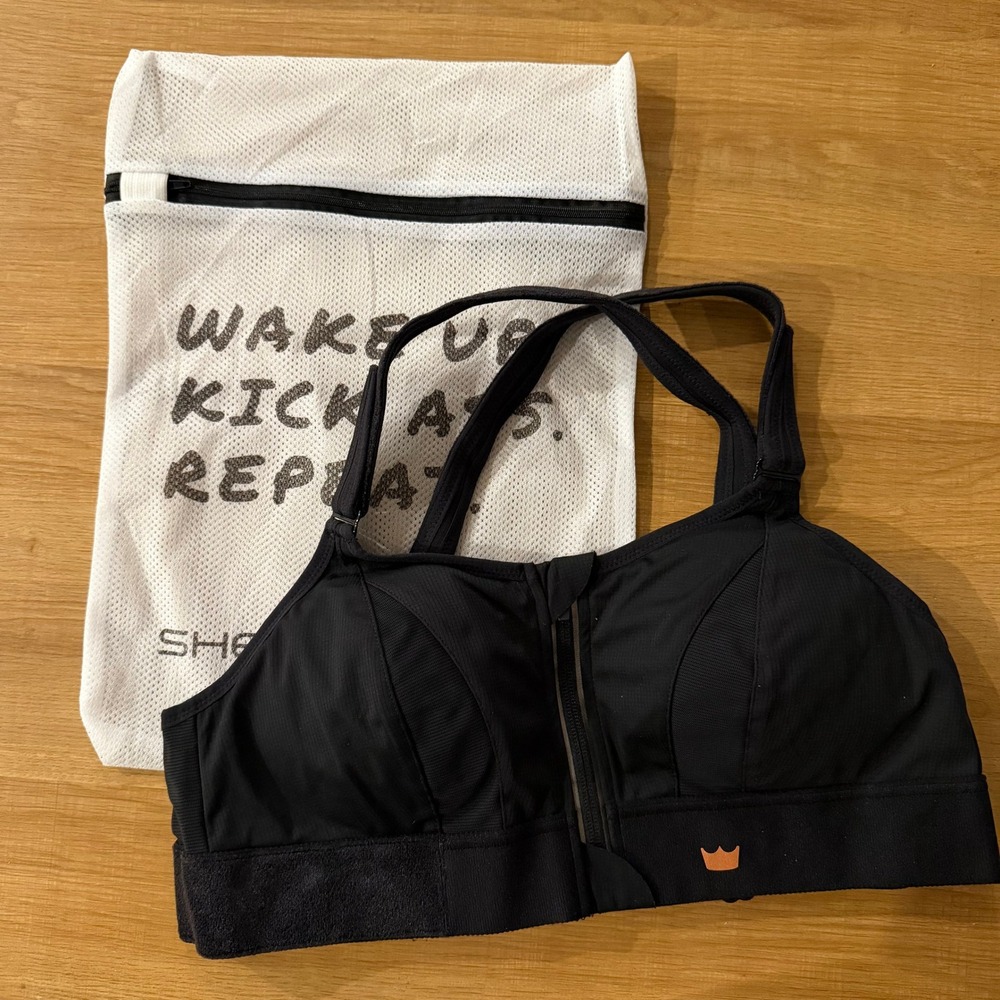 SHEFIT NWOT Ultimate Sport Bra Black Size Luxe High Impact Front Zip Wash Bag